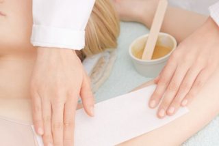 Waxing underarm with strips wax
